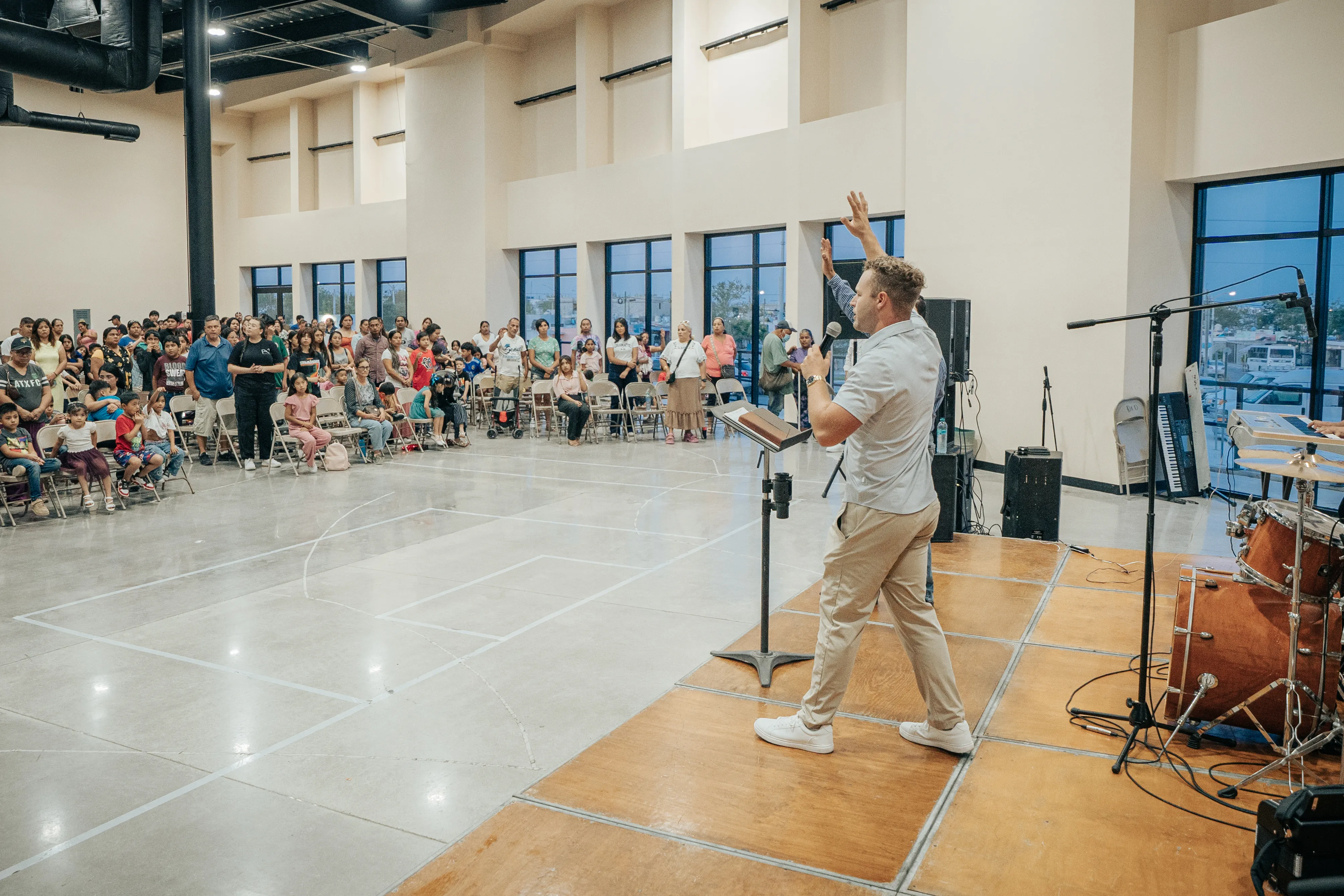 Evangelist Grayson Wilson ministering on stage